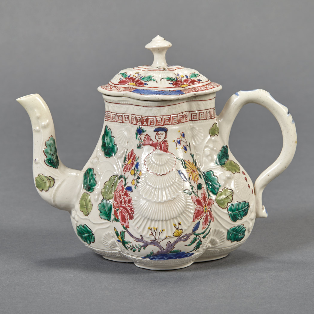 Appraisal: Staffordshire Pottery Molded Teapot Circa Decorated with chinoiserie motifs Height