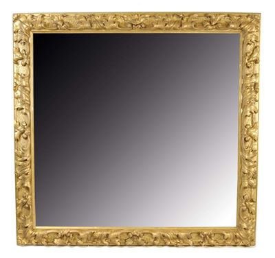 Appraisal: A large giltwood wall mirror the rectangular plate to a