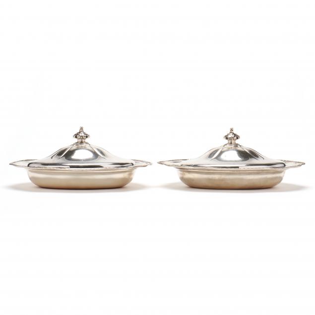 Appraisal: A PAIR OF STERLING SILVER ENTR E DISHES WITH COVERS