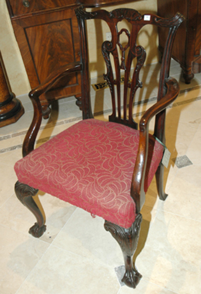 Appraisal: AN TH CENTURY IRISH MAHOGANY ARMCHAIR The shaped crest rail