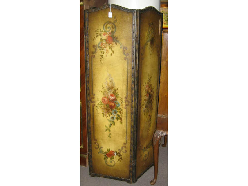 Appraisal: CONTINENTAL PAINTED LEATHER ROOM SCREEN Three panels painted with Rococo