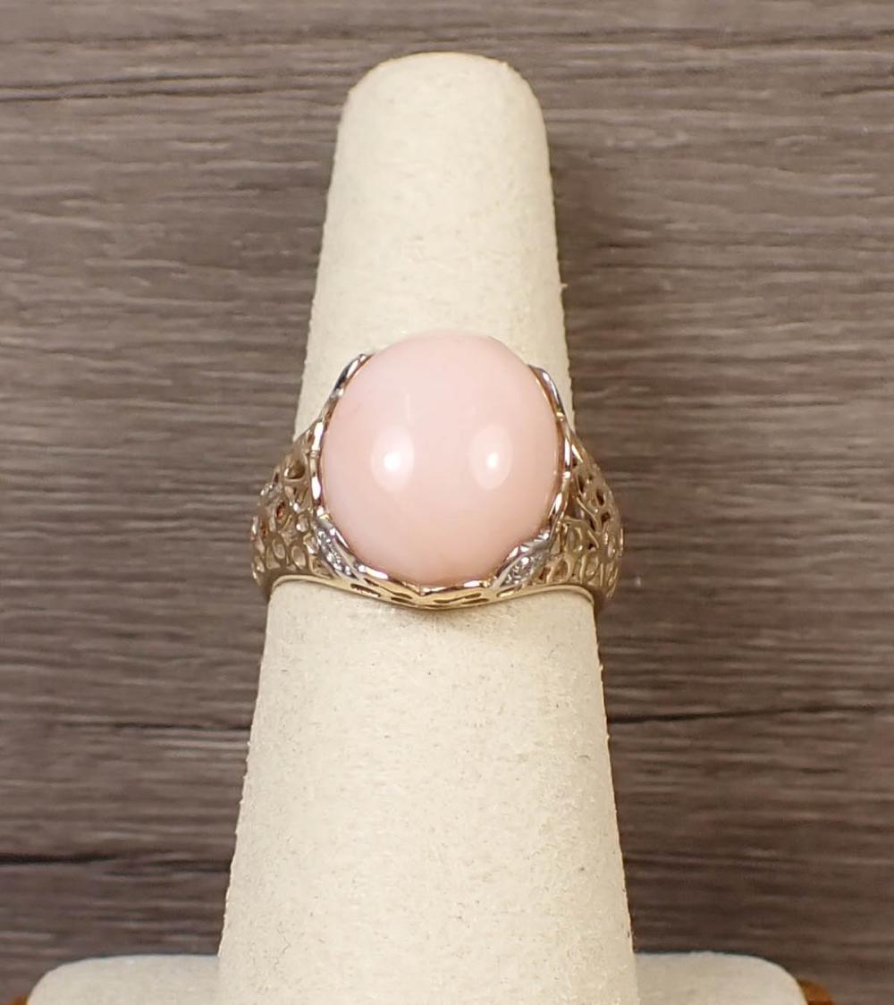 Appraisal: PINK CORAL AND FOURTEEN KARAT GOLD RING The k yellow