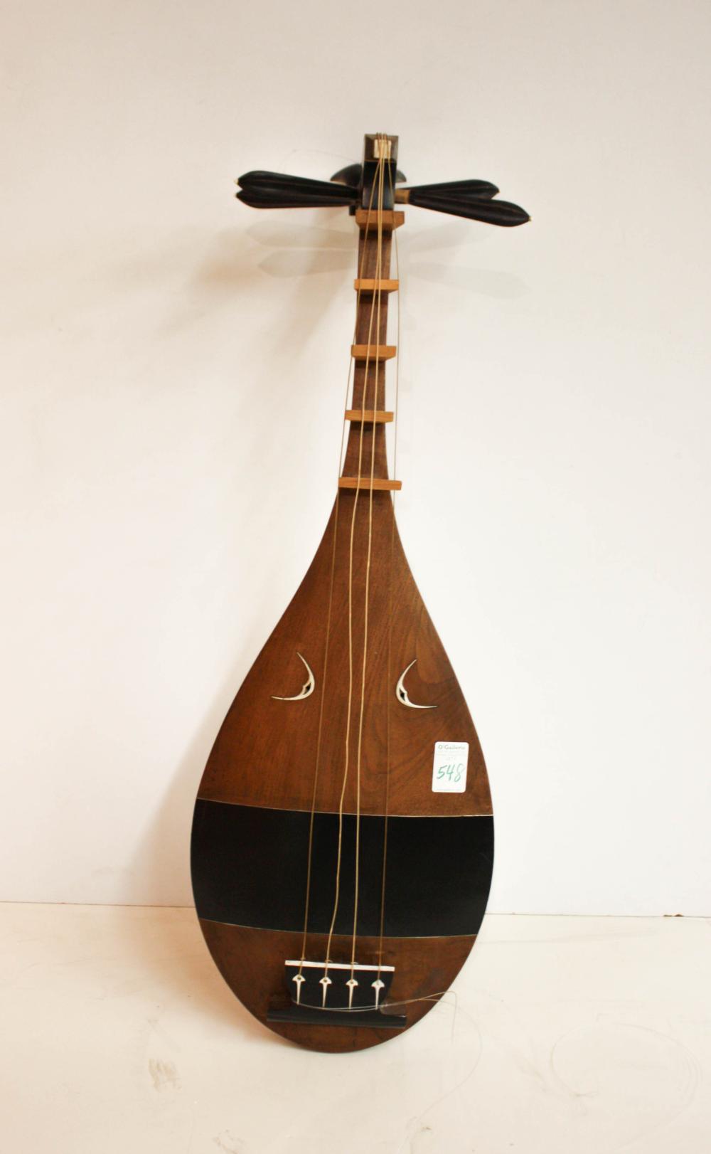 Appraisal: HEIKE-BIWA STRING INSTRUMENT a Japanese short-necked wood lute traditionally used