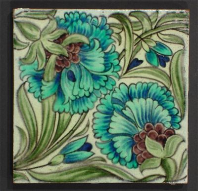 Appraisal: A William De Morgan tile painted with two carnation in