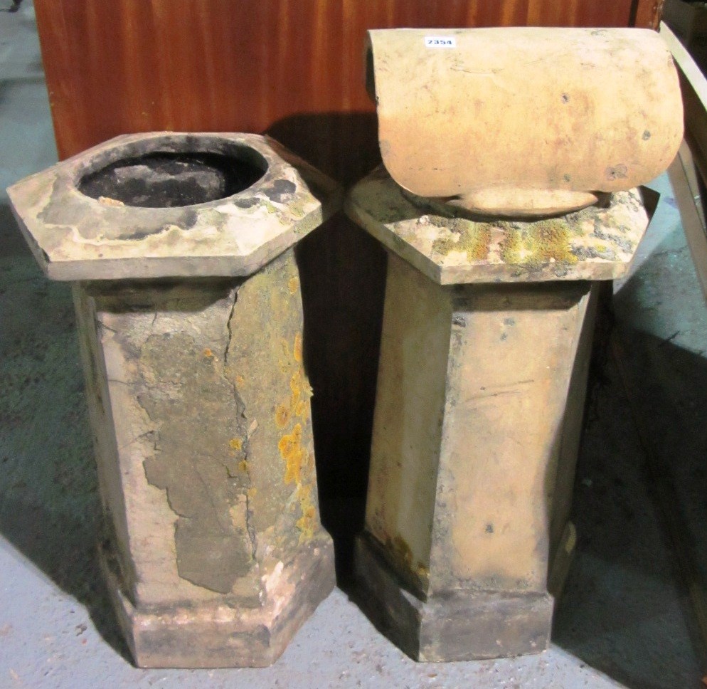 Appraisal: A hexagonal terracotta chimney pot and another similar