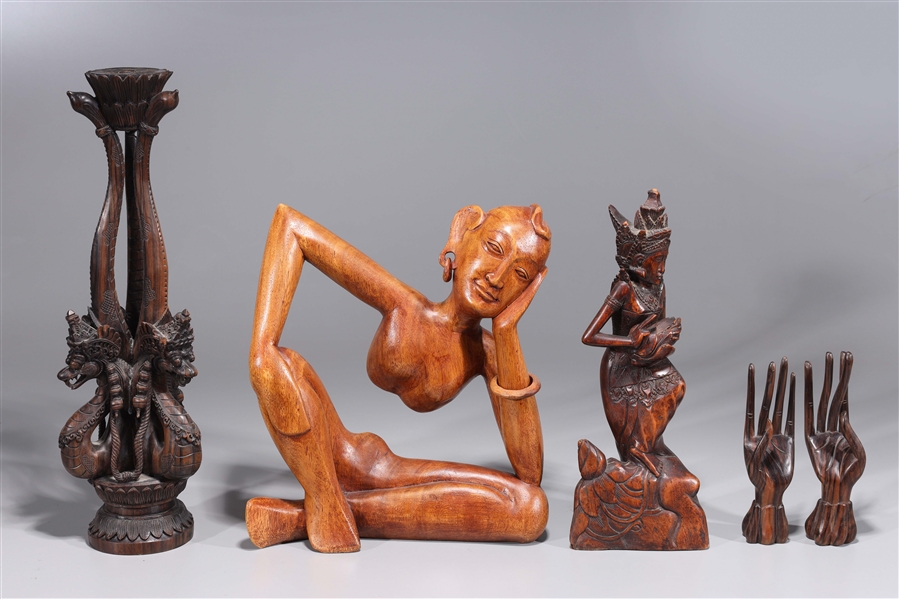 Appraisal: Group of five various Southeast Asian wood carvings including hands