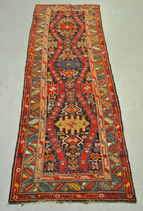 Appraisal: - Colorful oriental hall runner with overall geometric patterns x