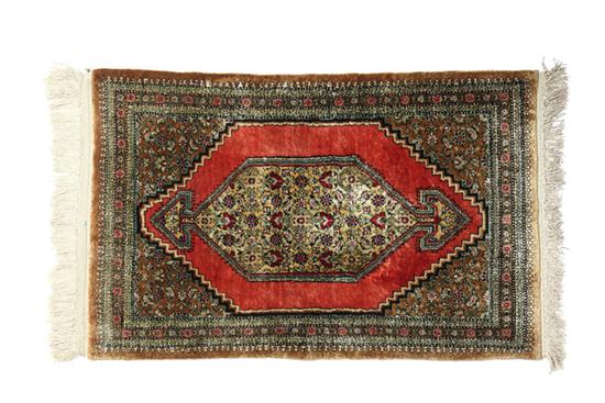 Appraisal: ORIENTAL RUG Twentieth century Qum Salmon ground with a yellow