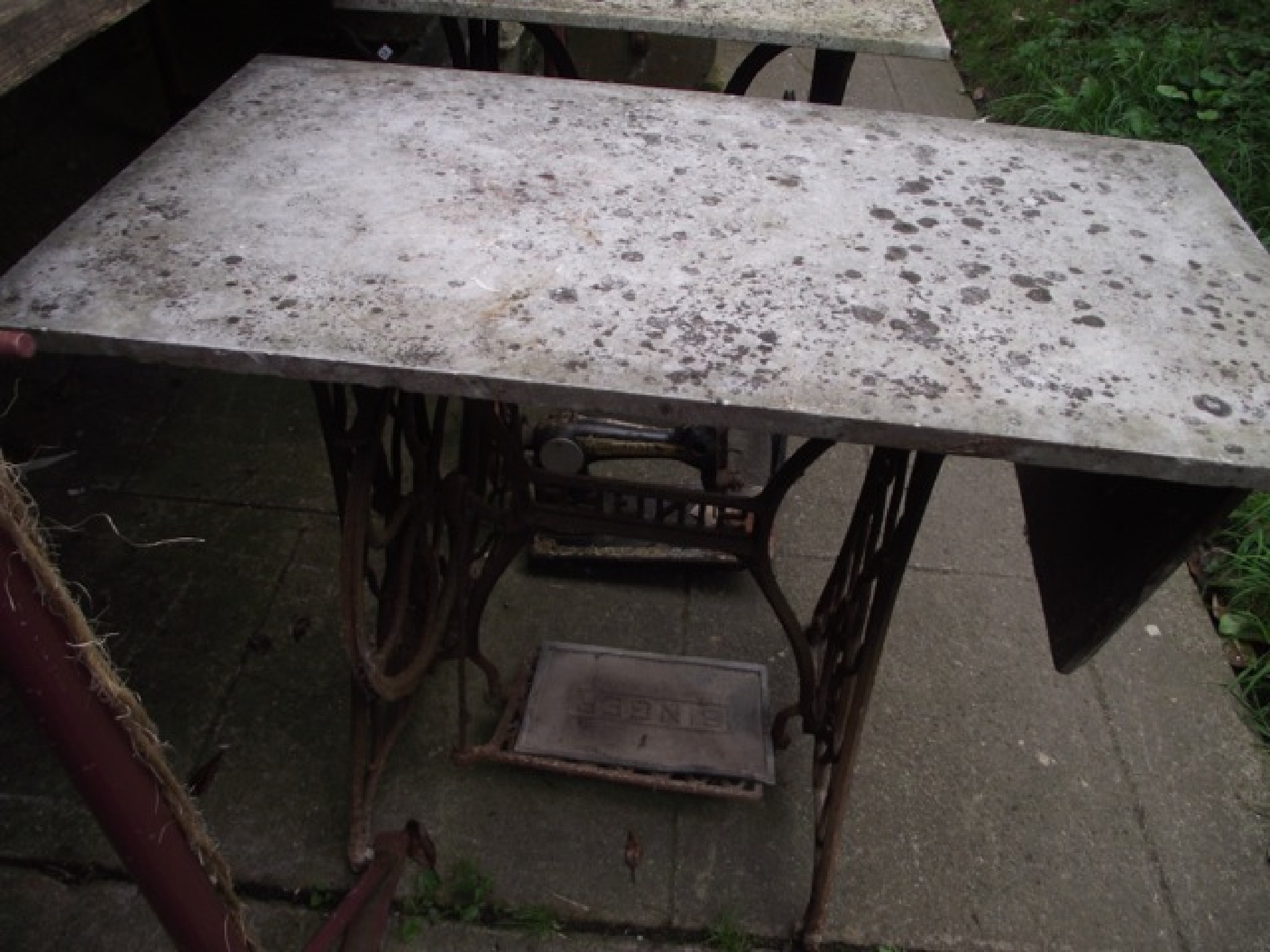 Appraisal: Two vintage cast iron Singer treadle sewing machine bases later