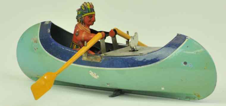 Appraisal: ARNOLD INDIAN AT CANOE Germany c 's lithographed tin canoe