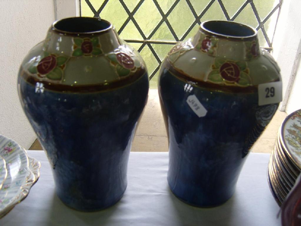 Appraisal: A pair of Royal Doulton vases of shouldered form with