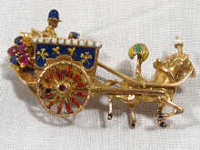 Appraisal: A hallmarked carat gold enamel ruby and sapphire brooch in