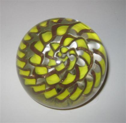 Appraisal: American glass paperweight With a yellow spiral twist center unsigned