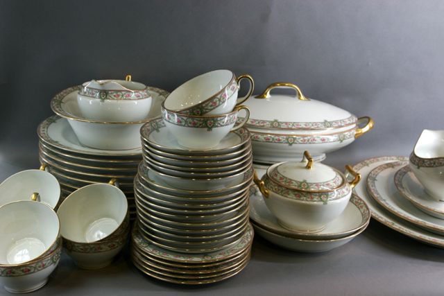 Appraisal: A Limoges part dinner service th century with gilt and