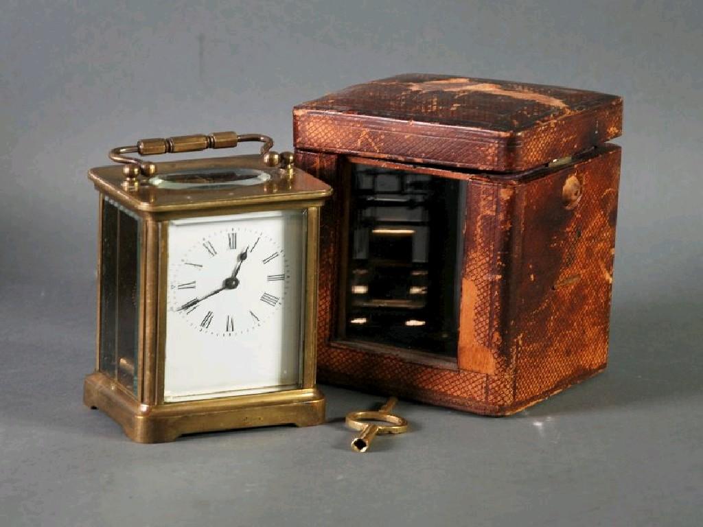 Appraisal: LATE NINETEENTH CENTURY BRASS AND BEVELLED PLATE GLASS CARRIAGE CLOCK