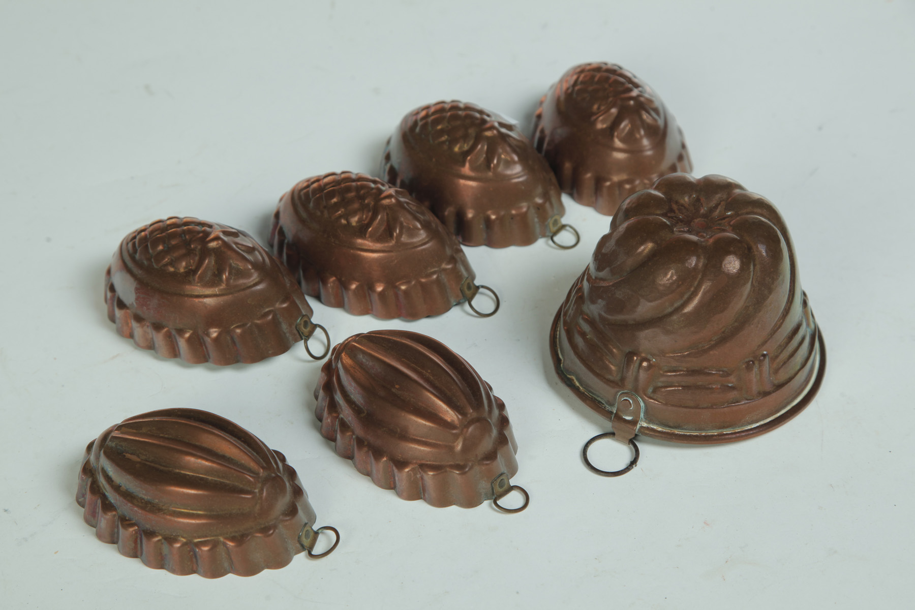 Appraisal: SEVEN SMALL COPPER FOOD MOLDS WITH ZINC LINING European st