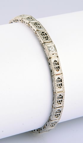 Appraisal: KW filigree link bracelet mm round diamond Approx ct long