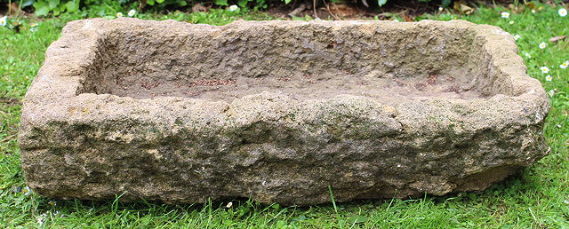 Appraisal: AN OLD ROUGH CUT STONE RECTANGULAR SHALLOW TROUGH cm wide