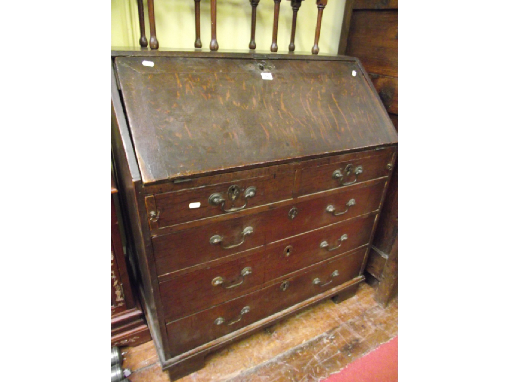 Appraisal: A Georgian oak countrymade bureau of three long and two