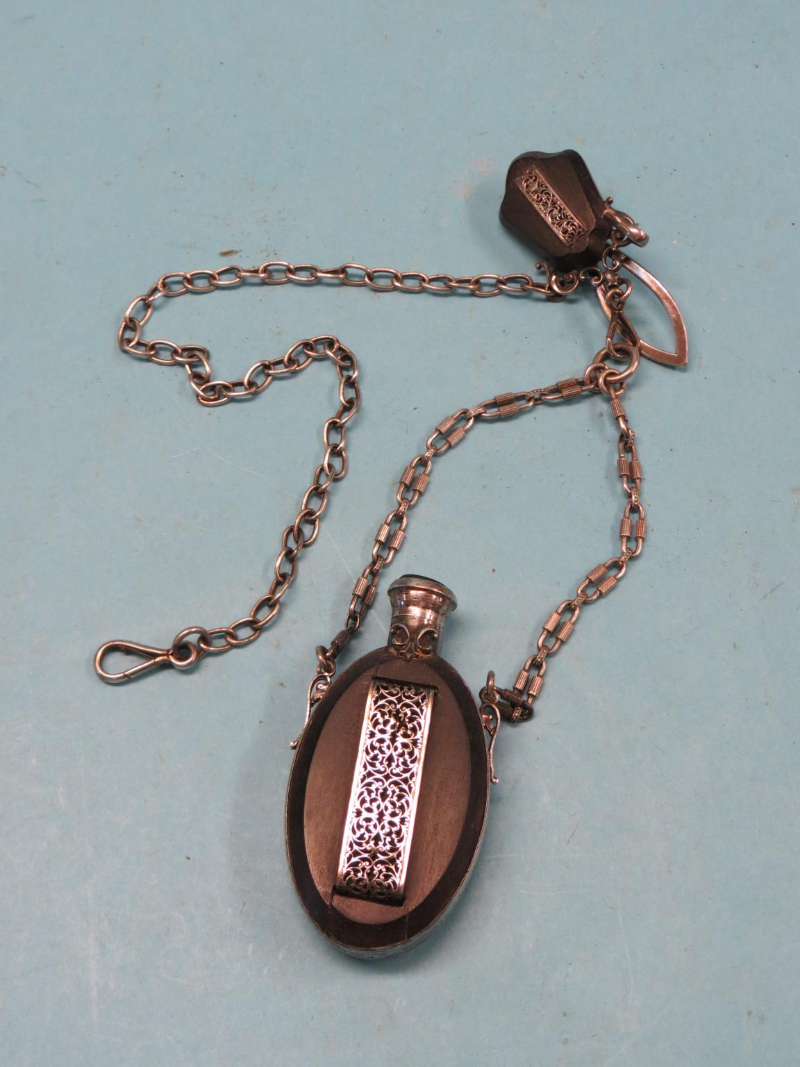 Appraisal: A late th century chatelaine pendant oval bottle with elaborate