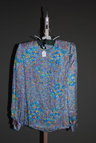 Appraisal: Andr Laug long sleeve silk blouse jewel neck gray blue