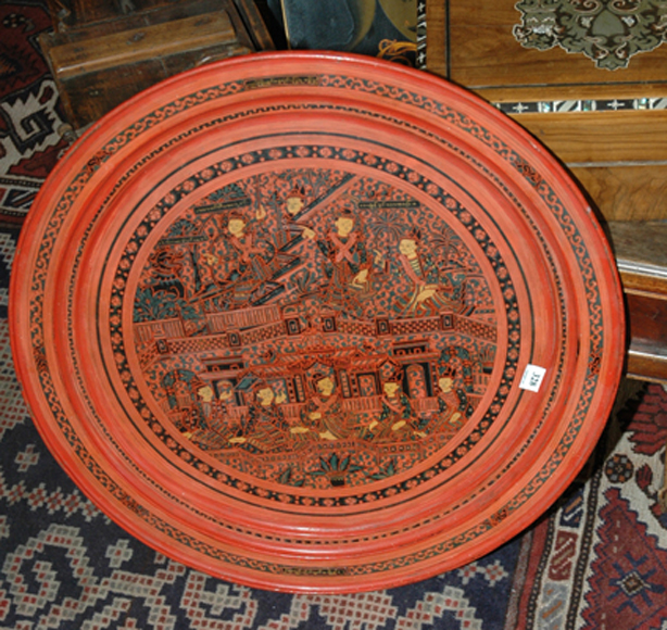 Appraisal: A JAVANESE EXPORTWARE RED LACQUERED TRAY Circular painted to the