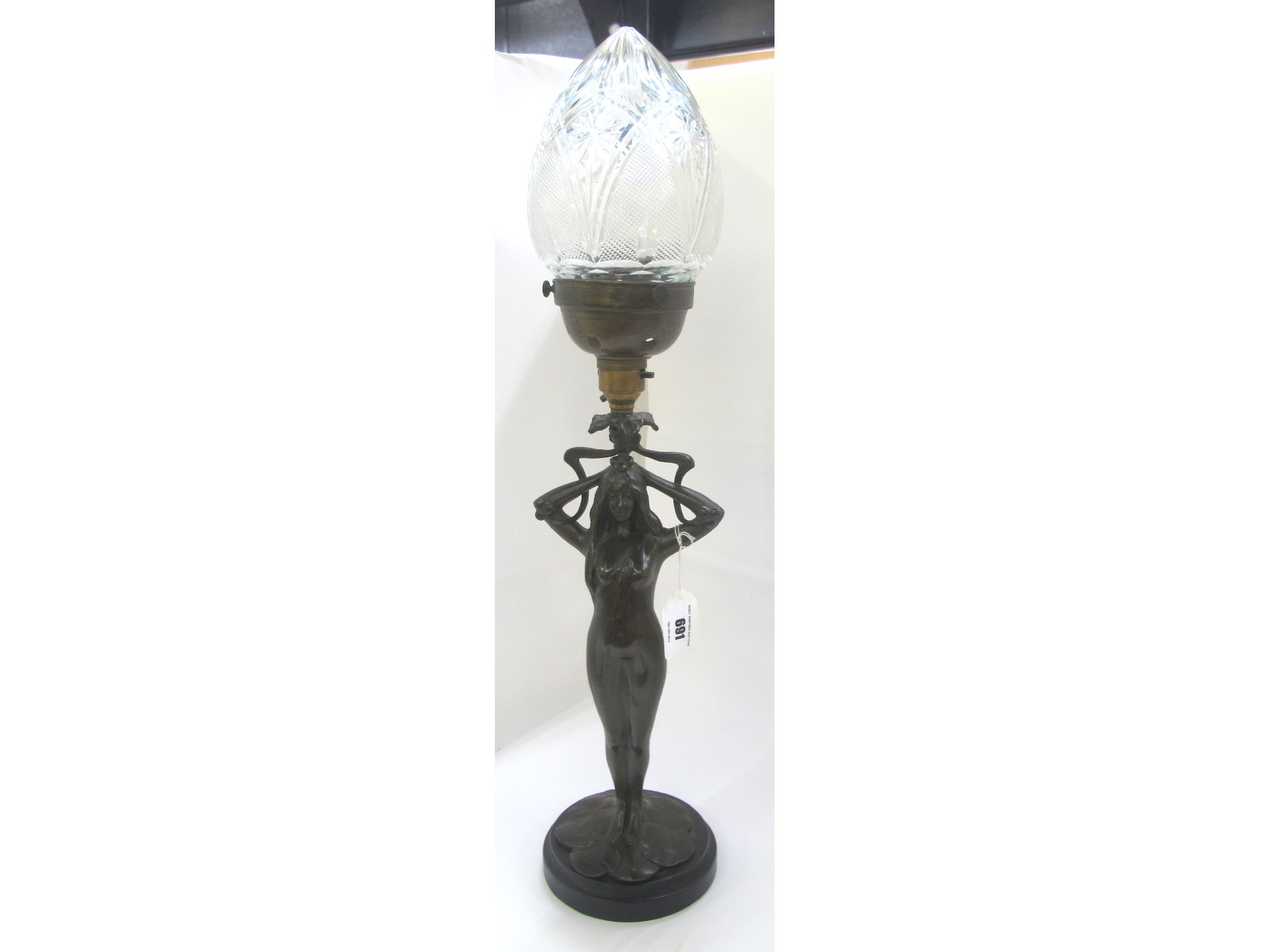 Appraisal: Bronzed spelter table lamp modelled as an Art Nouveau maiden