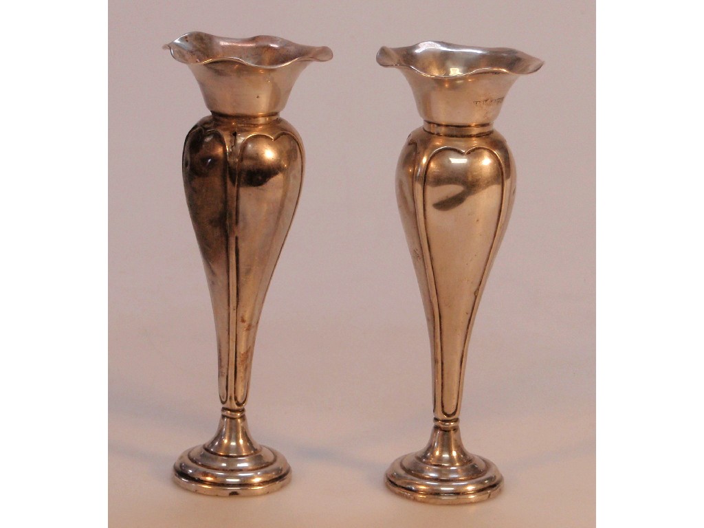 Appraisal: A pair of silver specimen vases with fluted rims panelled