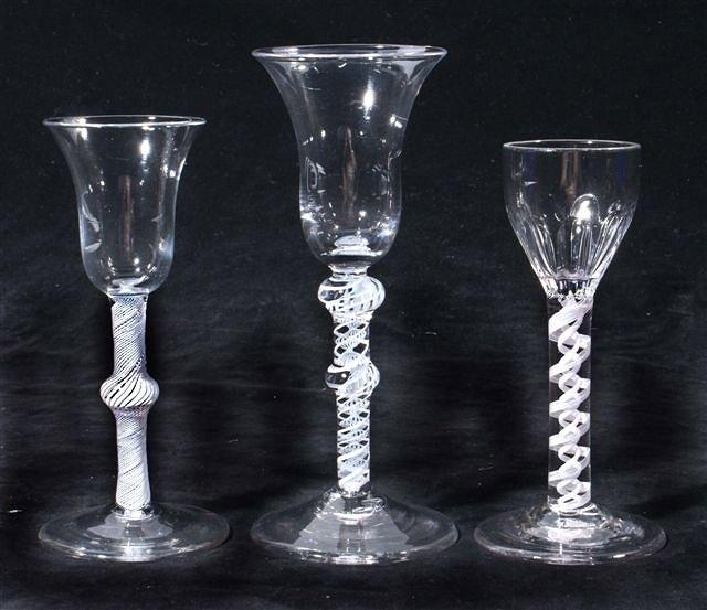 Appraisal: A COLLECTION OF THREE OPAQUE TWIST ALE GLASSES th century