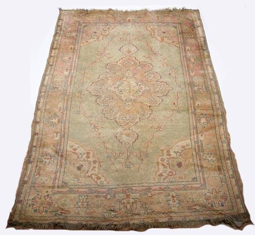 Appraisal: ORIENTAL RUG Oushak st quarter- th century Soft colors of