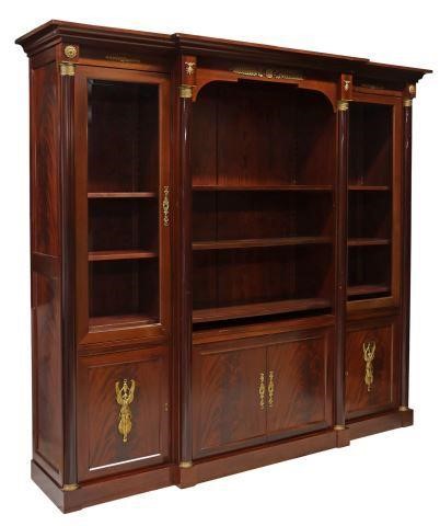 Appraisal: French Empire style mahogany breakfront bookcase th c molded cornice