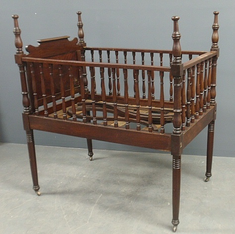 Appraisal: - Sheraton mahogany crib C with fold-down side and tester