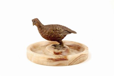 Appraisal: A cold painted bronze model of a grouse mounted on