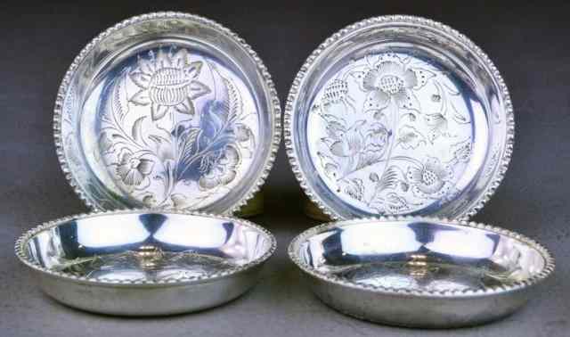 Appraisal: Small Sterling Silver DishesAll plates with floral and leaf scroll