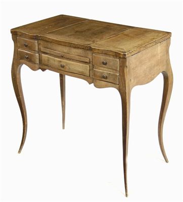 Appraisal: A French walnut dressing table the hinged with an adjustable