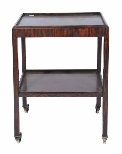 Appraisal: A Heals and Son buffet trolley two tiers with wheels