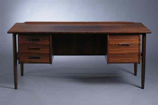 Appraisal: MID-CENTURY MODERN DANISH TEAKWOOD DESK Rectangular top over two banks