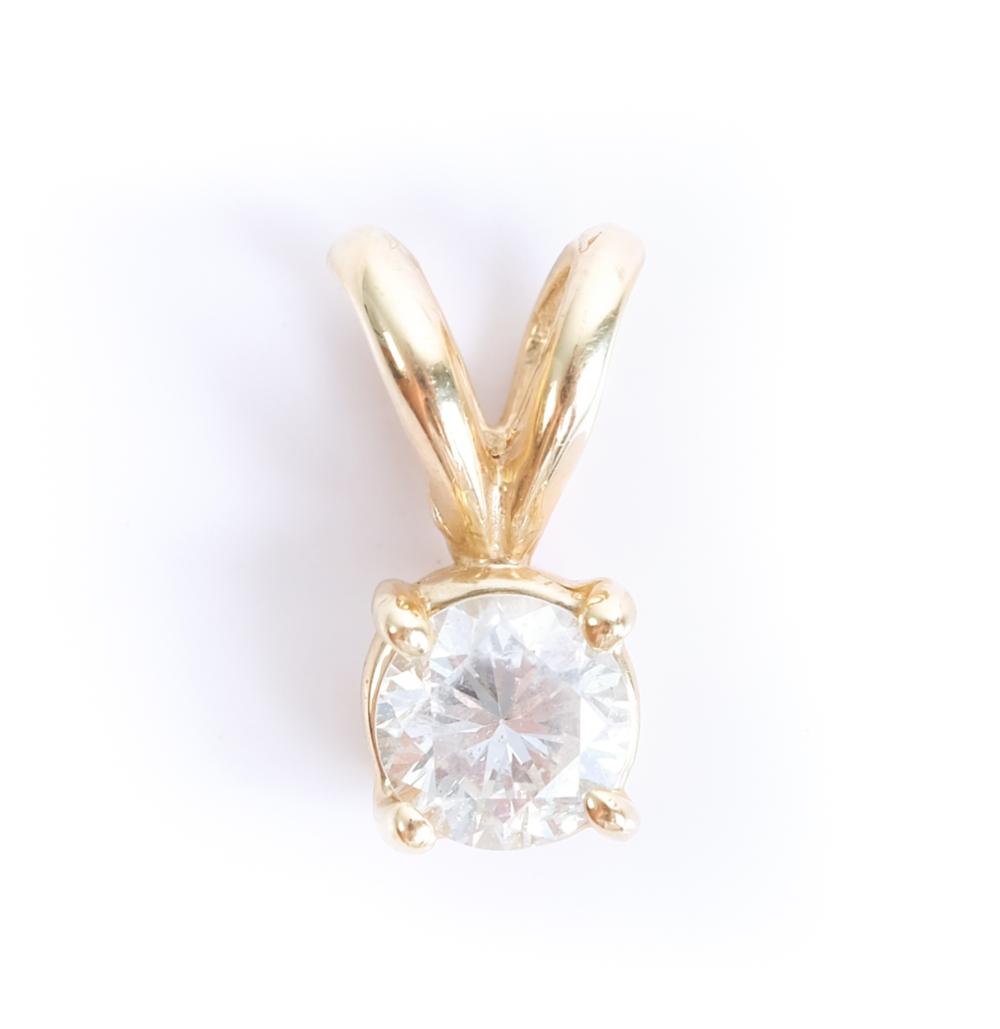 Appraisal: K YELLOW GOLD DIAMOND SOLITAIRE PENDANT K yellow gold solitaire