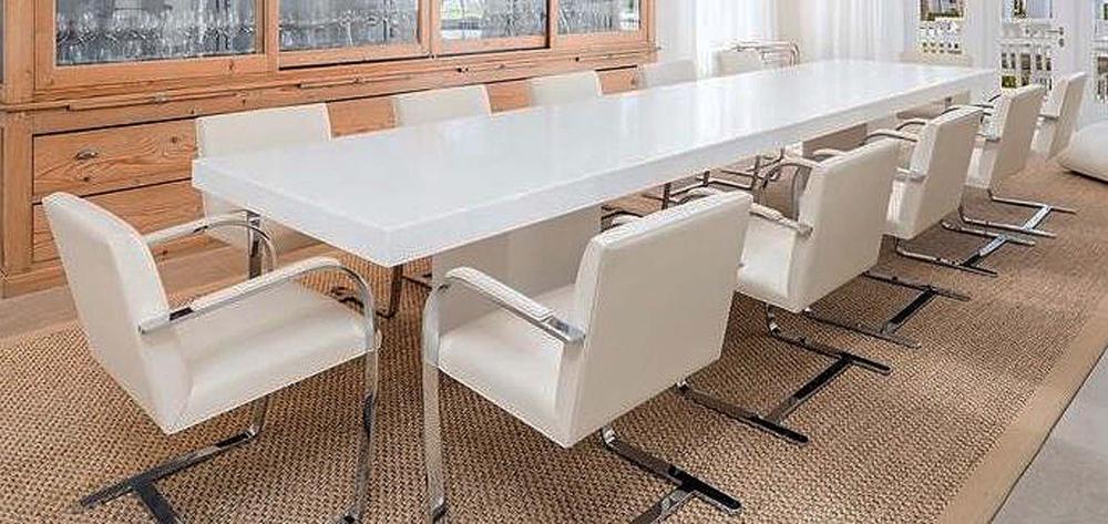 Appraisal: TWELVE KNOLL LEATHER UPHOLSTERED CHROME ARMCHAIRSDesigned by Mies Van Der