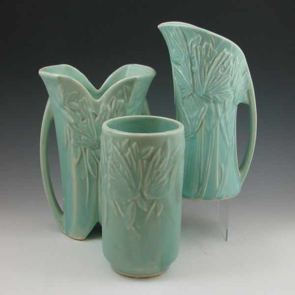 Appraisal: Two McCoy Butterfly vases and a pitcher The pitcher and