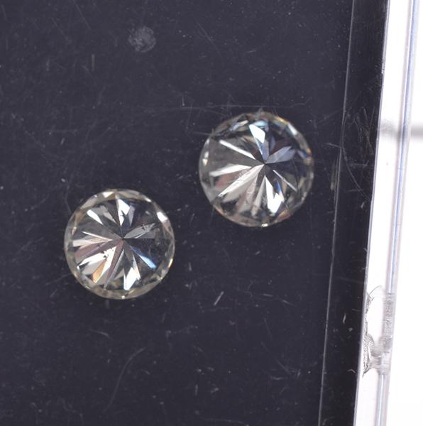 Appraisal: TWO ROUND BRILLIANT CUT DIAMONDS WEIGHING CTS AND CTS TWO