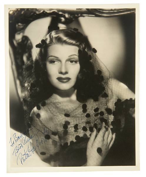 Appraisal: A Rita Hayworth signed black and white photograph s A