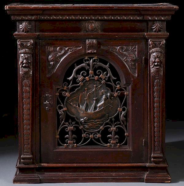 Appraisal: RENAISSANCE REVIVAL WALNUT LIQUOR CABINET A RENAISSANCE REVIVAL CARVED WALNUT