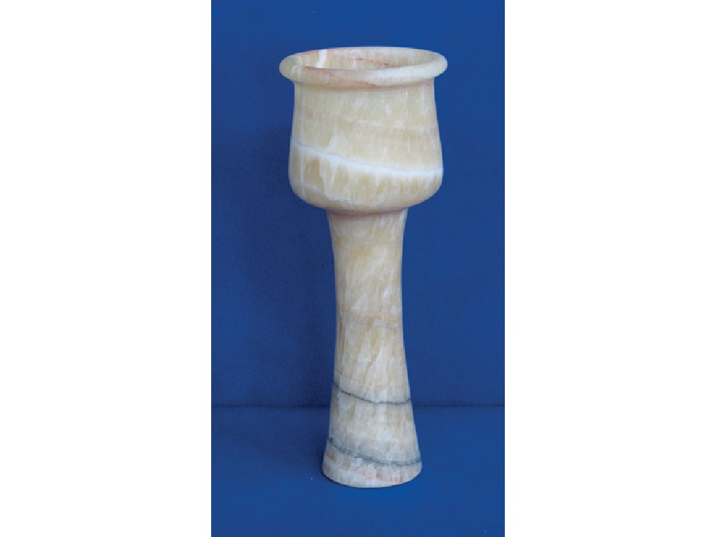 Appraisal: A BACTRIAN STYLE ALABASTER GOBLET in well striated stone with