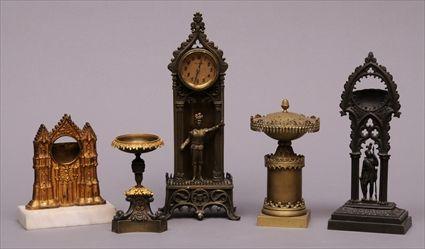 Appraisal: THREE GOTHIC REVIVAL GILT-METAL AND PATINATED-METAL POCKET WATCH STANDS Each