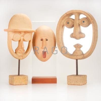 Appraisal: DAVID GIL BENNINGTON POTTERS Collection of three stoneware face sculptures