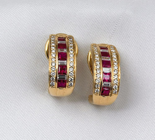 Appraisal: K yellow gold Spark earrings each containing square rubies diamond