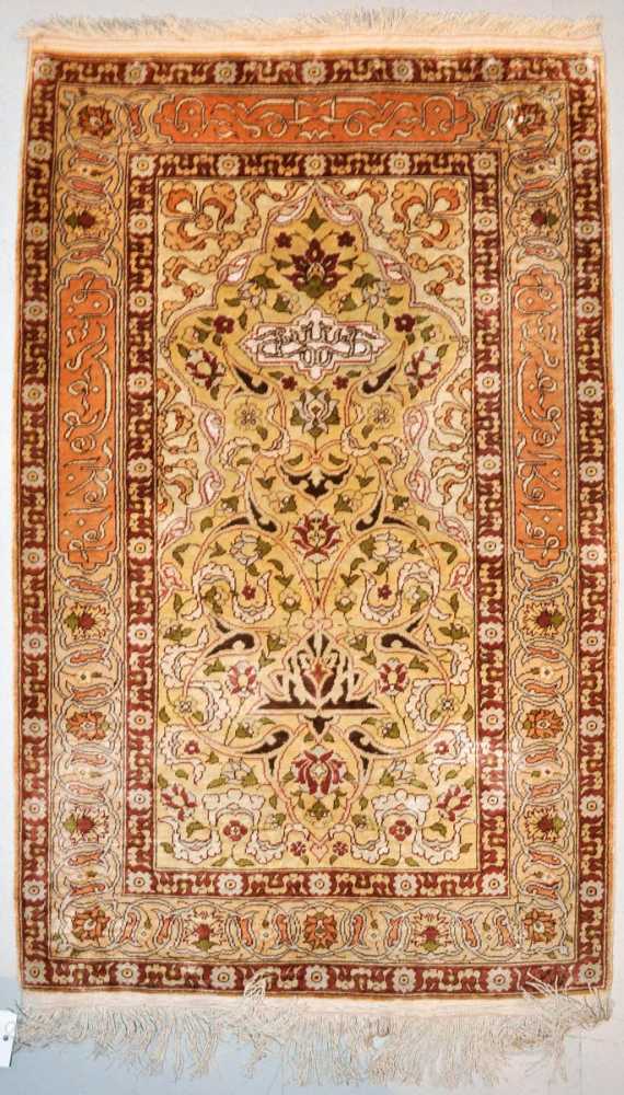 Appraisal: HEREKE silk Yellow central field with white spandrels finely decorated