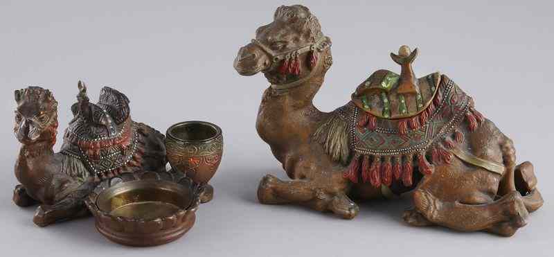 Appraisal: Viennese cold painted camel figures including camel seated with hinged