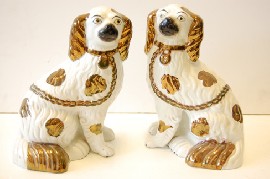 Appraisal: PAIR OF LATE TH CENTURY STAFFORDSHIRE SPANIELS